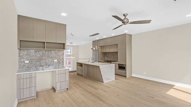336 E Pershing Rd, Chicago, IL 60653 - kitchen with modern cabinets, gray cabinets, a ceiling fan, light wood finished floors, and tasteful backsplash