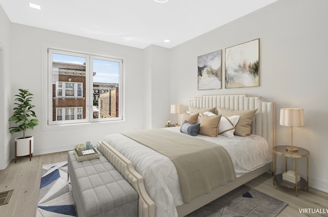 336 E Pershing Rd, Chicago, IL 60653 - bedroom featuring light wood-style flooring and baseboards