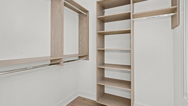 336 E Pershing Rd, Chicago, IL 60653 - walk in closet with wood finished floors