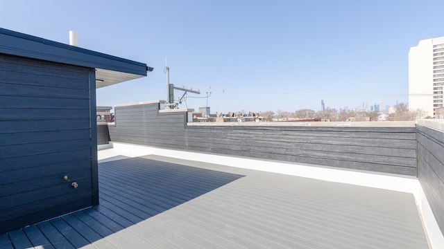 336 E Pershing Rd, Chicago, IL 60653 - wooden terrace with a view of city