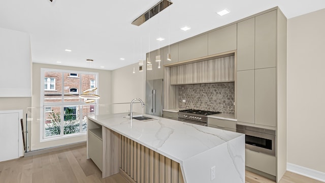 336 E Pershing Rd, Chicago, IL 60653 - kitchen featuring modern cabinets, high end appliances, light wood-style flooring, and recessed lighting