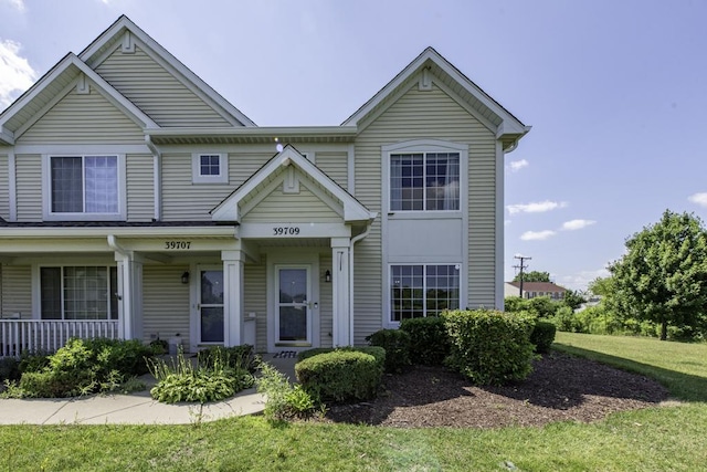 39709 N Warren Ln, Beach Park, IL 60083 - multi unit property featuring a front yard and covered porch