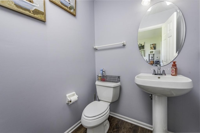 39709 N Warren Ln, Beach Park, IL 60083 - half bath featuring wood finished floors and toilet