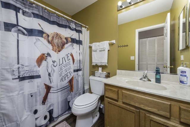 39709 N Warren Ln, Beach Park, IL 60083 - full bathroom featuring vanity, wood finished floors, and a shower with shower curtain