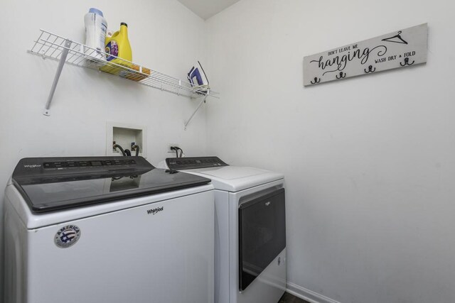 39709 N Warren Ln, Beach Park, IL 60083 - washroom featuring washer and clothes dryer and baseboards