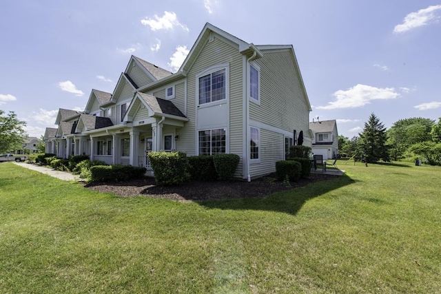 39709 N Warren Ln, Beach Park, IL 60083 - view of home's exterior with a yard