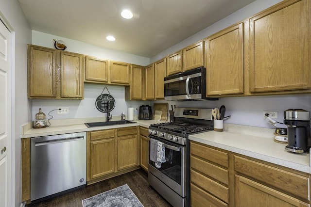 39709 N Warren Ln, Beach Park, IL 60083 - kitchen featuring appliances with stainless steel finishes, dark wood-style flooring, light countertops, and recessed lighting