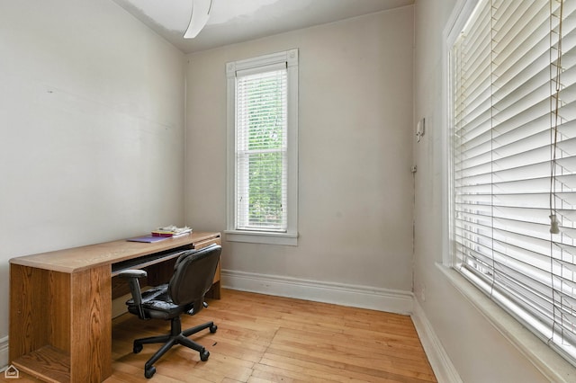 2240 S Avers Ave, Chicago, IL 60623 - office featuring light wood-style flooring and plenty of natural light