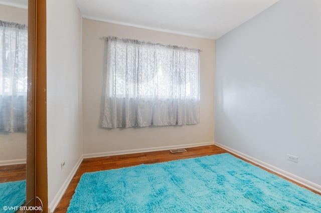 8937 Fairlane Dr, Bridgeview, IL 60455 - unfurnished room with wood finished floors and baseboards