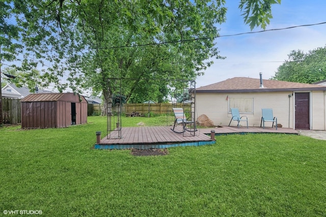 8937 Fairlane Dr, Bridgeview, IL 60455 - fenced backyard with a storage unit and a wooden deck