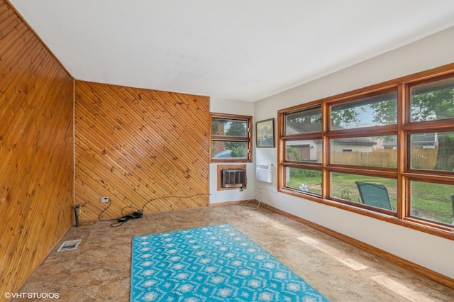 8937 Fairlane Dr, Bridgeview, IL 60455 - unfurnished room featuring wood walls and an AC wall unit