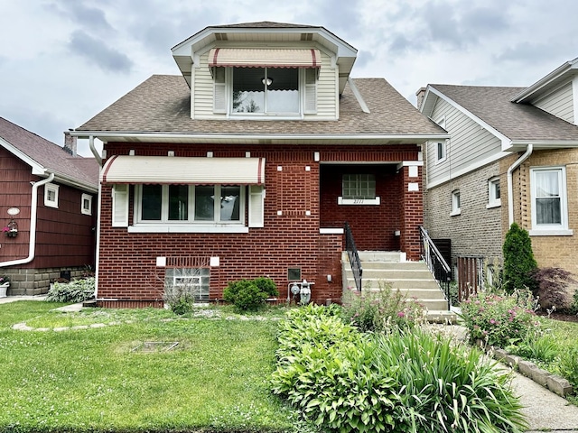 2111 N 75th Ct, Elmwood Park, IL 60707 - bungalow-style house featuring brick siding, a front yard, and a shingled roof
