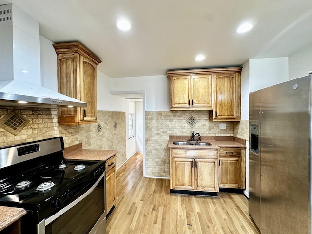 2111 N 75th Ct, Elmwood Park, IL 60707 - kitchen with stainless steel appliances, wall chimney exhaust hood, light wood-style floors, light countertops, and decorative backsplash