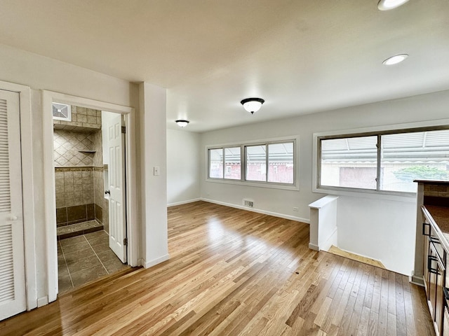 2111 N 75th Ct, Elmwood Park, IL 60707 - unfurnished dining area featuring wood finished floors and recessed lighting