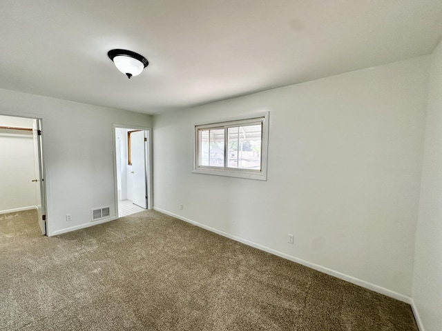 2111 N 75th Ct, Elmwood Park, IL 60707 - unfurnished bedroom with carpet and a walk in closet