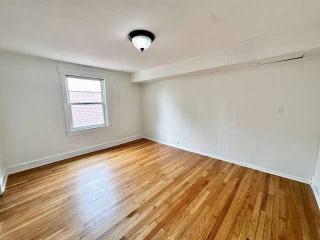 2111 N 75th Ct, Elmwood Park, IL 60707 - spare room with light wood-style floors and baseboards