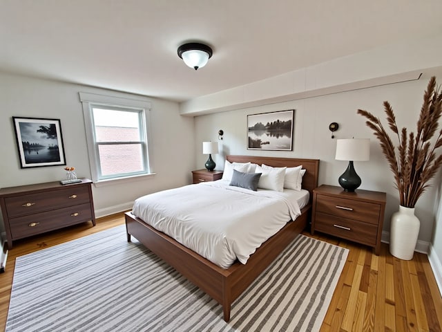 2111 N 75th Ct, Elmwood Park, IL 60707 - bedroom featuring light wood-type flooring and baseboards
