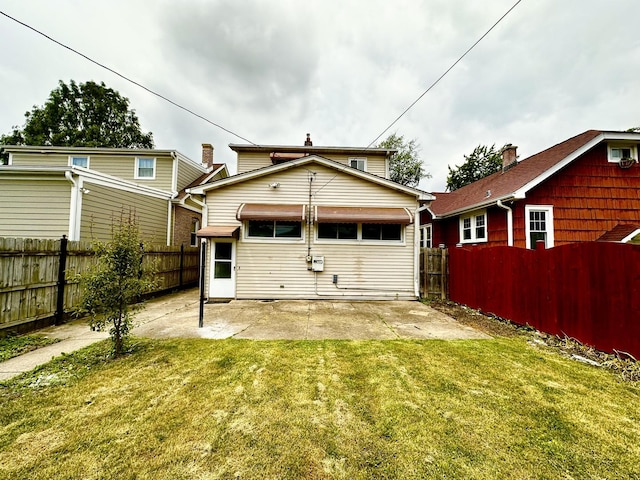 2111 N 75th Ct, Elmwood Park, IL 60707 - back of house featuring a patio and a fenced backyard