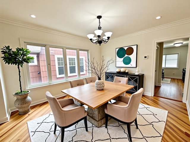 2111 N 75th Ct, Elmwood Park, IL 60707 - dining space with a chandelier, crown molding, light wood finished floors, and recessed lighting