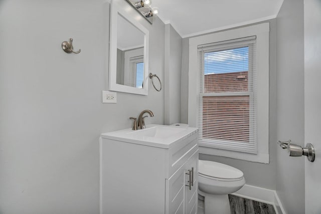 8107 S Princeton Ave, Chicago, IL 60620 - half bathroom with vanity and wood finished floors