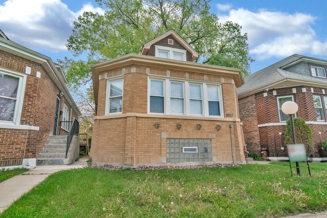8107 S Princeton Ave, Chicago, IL 60620 - view of front of home with brick siding and a front yard