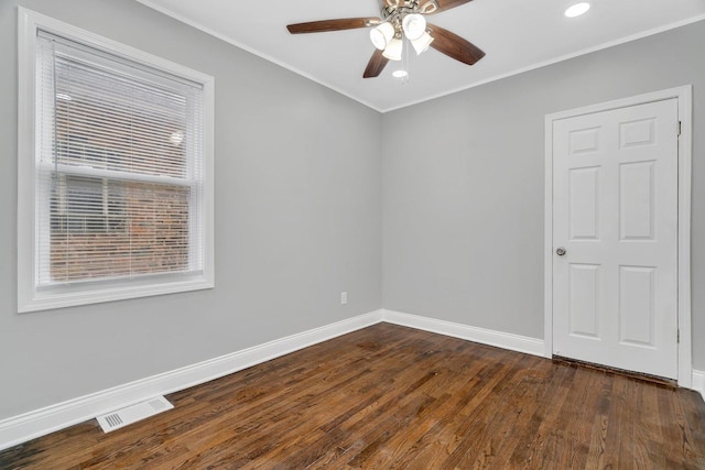 8107 S Princeton Ave, Chicago, IL 60620 - empty room with ornamental molding, dark wood finished floors, ceiling fan, and recessed lighting