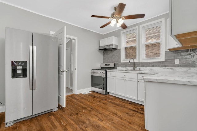 8107 S Princeton Ave, Chicago, IL 60620 - kitchen featuring stainless steel appliances, under cabinet range hood, backsplash, dark wood-type flooring, and ceiling fan