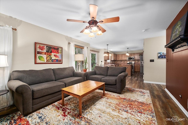 3402 Hoffman St, Plano, IL 60545 - living area featuring dark wood-style floors and ceiling fan