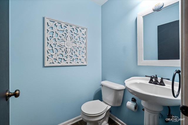 3402 Hoffman St, Plano, IL 60545 - half bath featuring toilet and baseboards