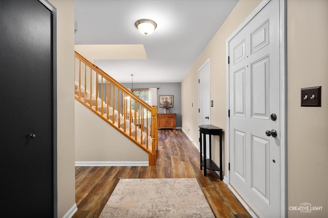 3402 Hoffman St, Plano, IL 60545 - entrance foyer featuring dark wood-style floors, stairs, and a chandelier