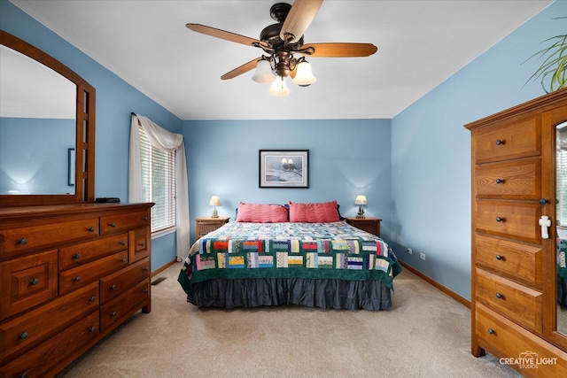 3402 Hoffman St, Plano, IL 60545 - bedroom featuring light colored carpet and a ceiling fan