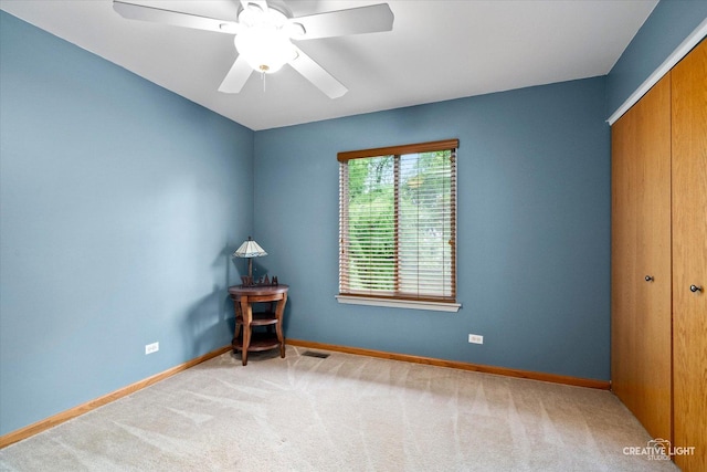 3402 Hoffman St, Plano, IL 60545 - unfurnished bedroom with a closet, carpet flooring, and a ceiling fan