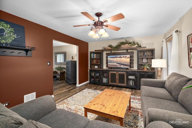 3402 Hoffman St, Plano, IL 60545 - living room with a ceiling fan and wood finished floors
