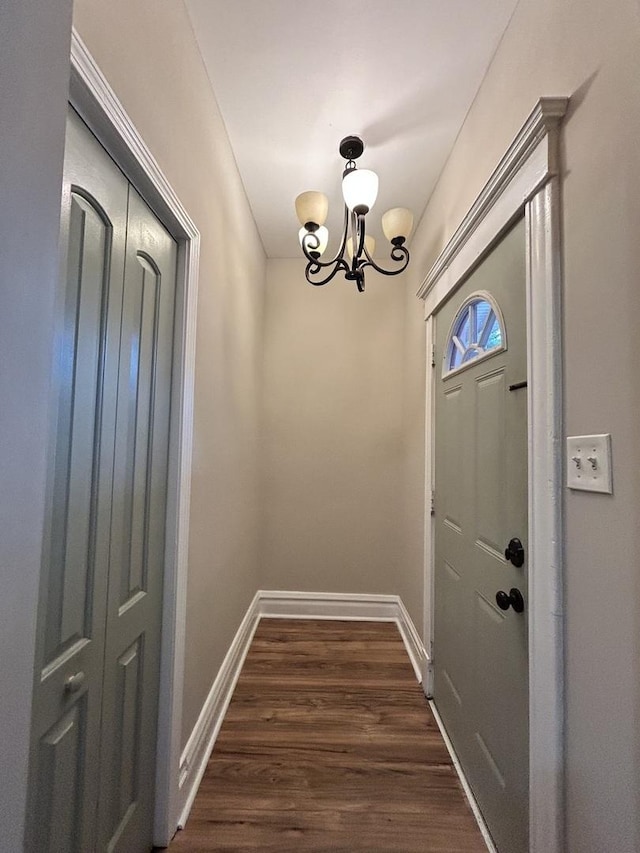 2122 N Lorel Ave, Chicago, IL 60639 - entryway featuring a chandelier and dark wood-style floors