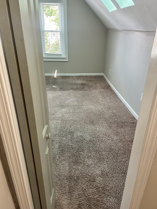 2122 N Lorel Ave, Chicago, IL 60639 - bonus room featuring a skylight, carpet, and lofted ceiling
