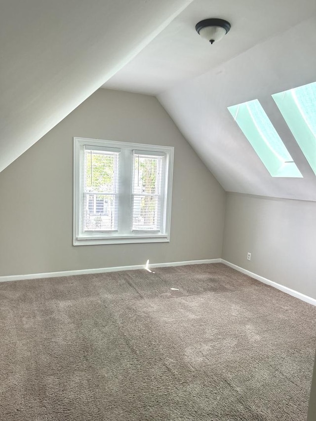 2122 N Lorel Ave, Chicago, IL 60639 - bonus room featuring carpet, a skylight, and lofted ceiling