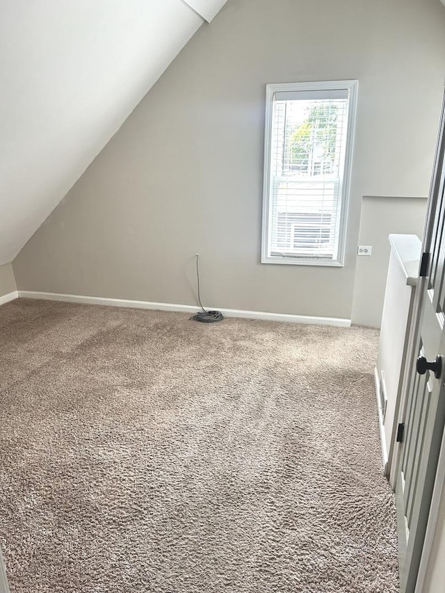 2122 N Lorel Ave, Chicago, IL 60639 - additional living space with lofted ceiling and carpet