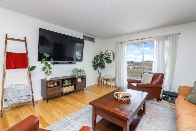 110 W Butterfield Rd Unit 503S, Elmhurst, IL 60126 - living room with light wood-style floors