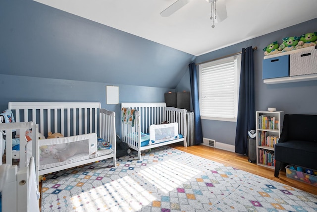 1155 E Walnut Ave, Des Plaines, IL 60016 - bedroom with wood finished floors, lofted ceiling, and ceiling fan