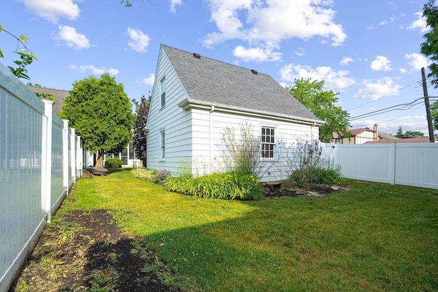 1155 E Walnut Ave, Des Plaines, IL 60016 - view of property exterior featuring a shingled roof and a fenced backyard