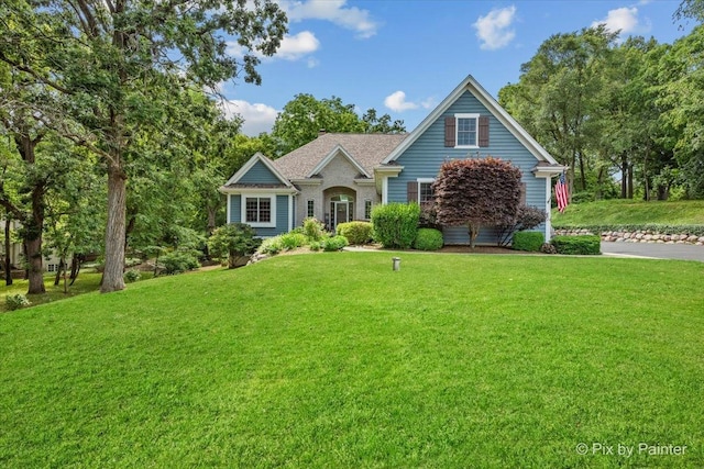6407 Kingsbridge Dr, Cary, IL 60013 - view of front of house with a front lawn