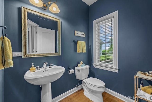 6407 Kingsbridge Dr, Cary, IL 60013 - half bath featuring toilet and wood finished floors