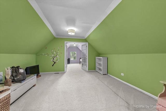 6407 Kingsbridge Dr, Cary, IL 60013 - additional living space with carpet floors and vaulted ceiling