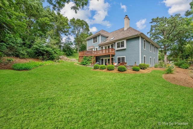 6407 Kingsbridge Dr, Cary, IL 60013 - rear view of property featuring a yard, a wooden deck, and a chimney