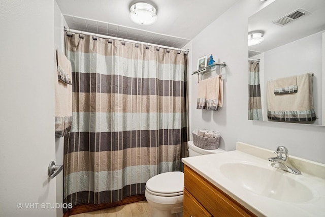 1037 Arbor Ln, Glenview, IL 60025 - bathroom featuring vanity, wood finished floors, and a shower with curtain