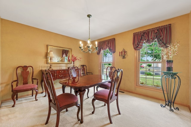 12 White Oak Ct, Algonquin, IL 60102 - dining area featuring a chandelier and light colored carpet