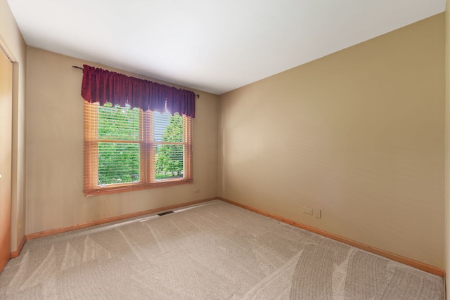 12 White Oak Ct, Algonquin, IL 60102 - carpeted spare room with baseboards