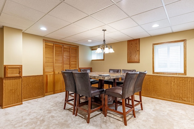12 White Oak Ct, Algonquin, IL 60102 - dining room featuring a wainscoted wall, a drop ceiling, wood walls, light carpet, and recessed lighting