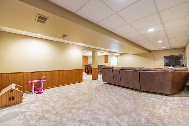 12 White Oak Ct, Algonquin, IL 60102 - carpeted living room featuring a drop ceiling, a wainscoted wall, wood walls, and recessed lighting