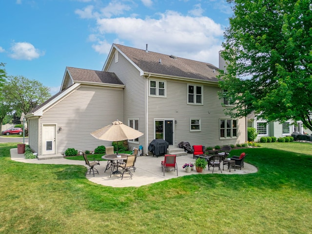 12 White Oak Ct, Algonquin, IL 60102 - back of house featuring a lawn, a chimney, a patio, and roof with shingles